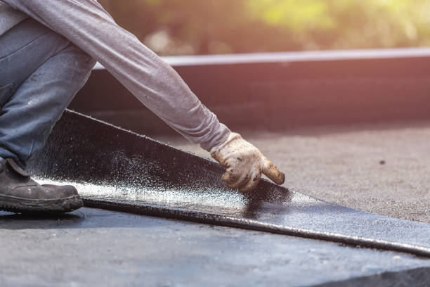 Professional Basement Waterproofing technician working in Electra, TX